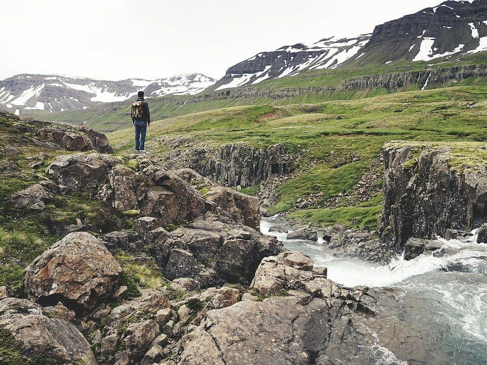 Hiking in Iceland mountains and stream