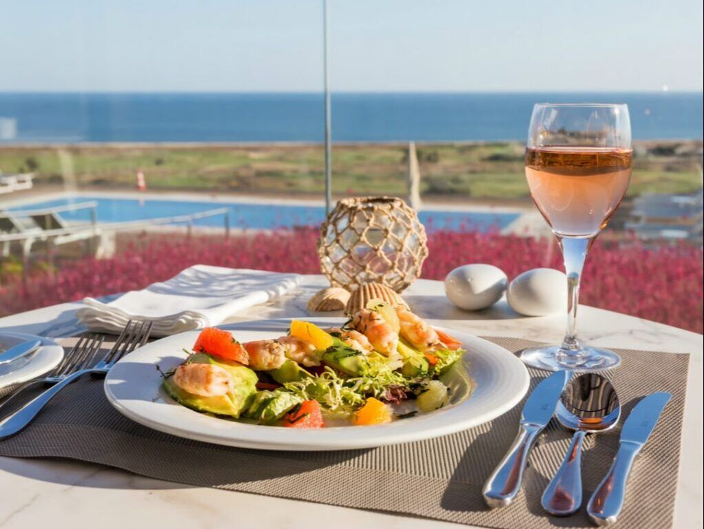Lunch with wine view of ocean Lagos Portugal