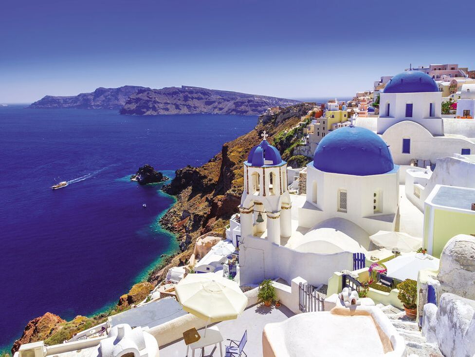 Santorini Greece whitewashed hotels and ocean